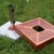 SONLEX Attraktiver Sonnenschirmständer aus Granit mit exklusiver Holzabdeckung, Edelstahlhülse und Reduzierring, quadratisch, 25 kg, braun - 3